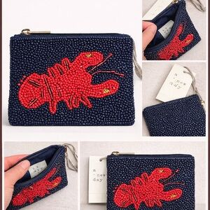 A New Day Navy Beaded Wallet with Red Lobster Motif